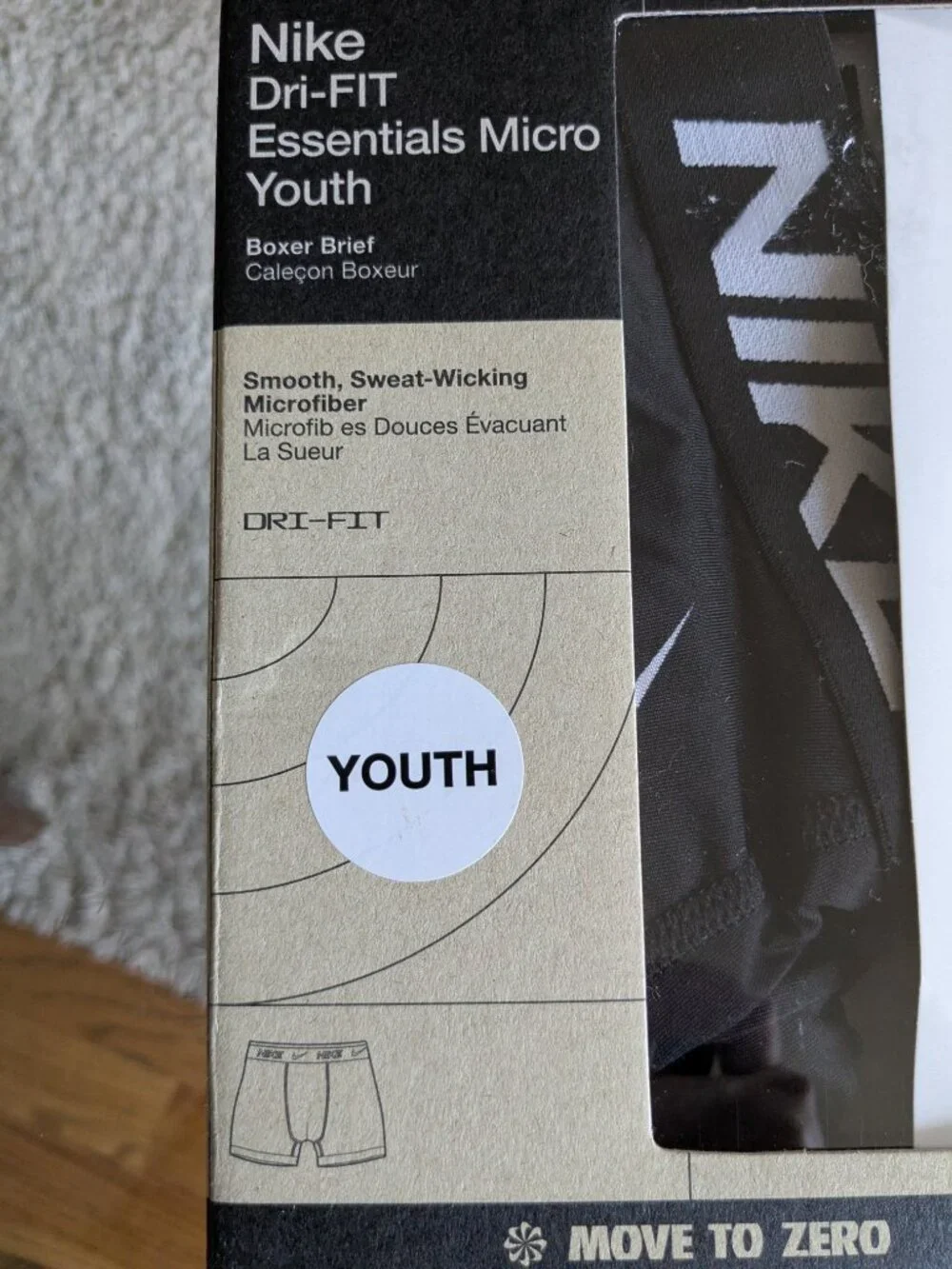 A pair of boy's Nike Dri-Fit Boxer Brief with logos
